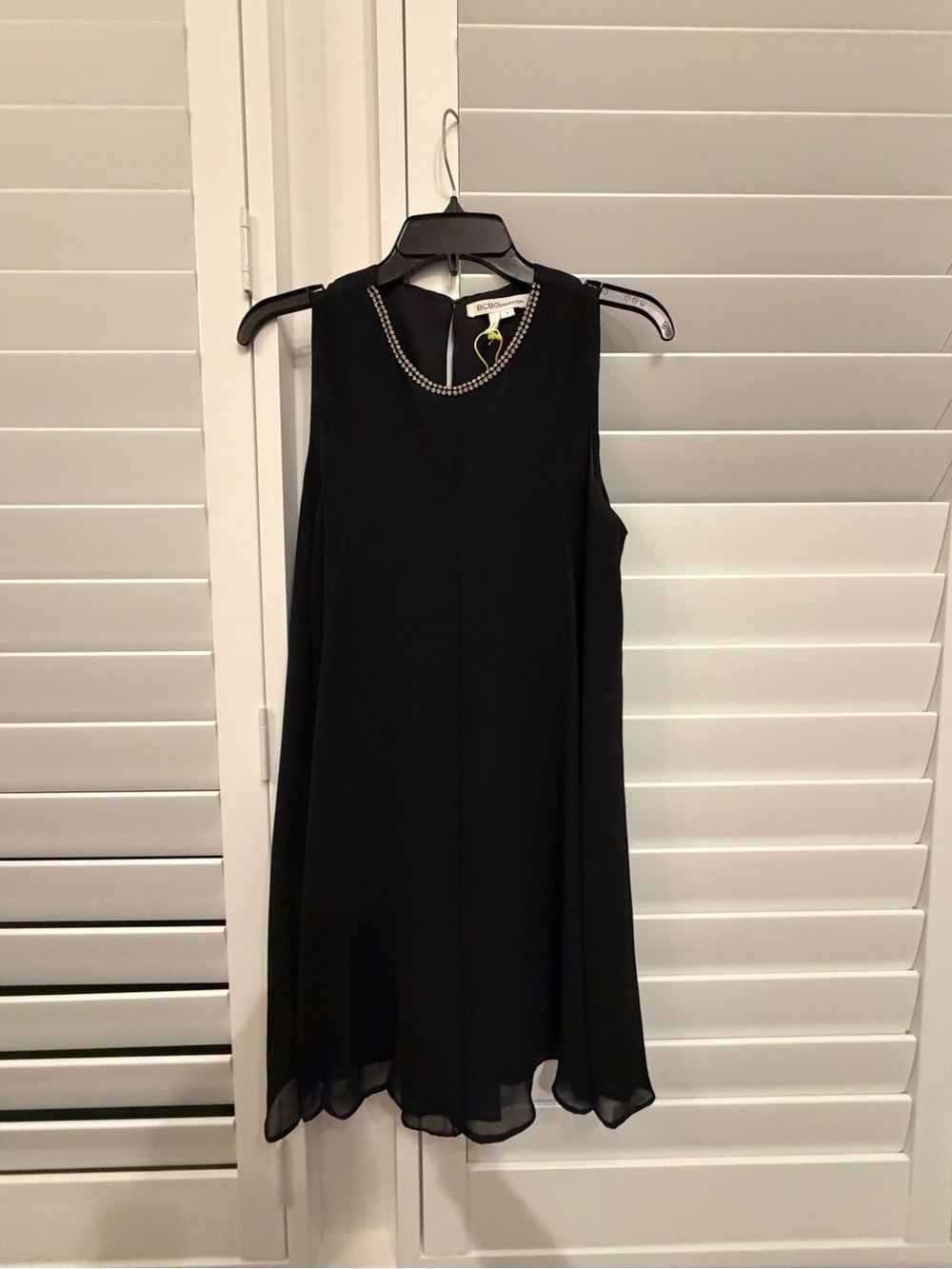 BCBGeneration Black Sleeveless Mini Dress with Beaded Neckline